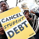 WASHINGTON, DC - JANUARY 13: Student loan borrowers and the Too Much Talent Band thank President Joe Biden and Vice President Kamala Harris for extending the student loan pause and now demand that they cancel student debt at a gathering outside The White House on January 13, 2022, in Washington, DC.